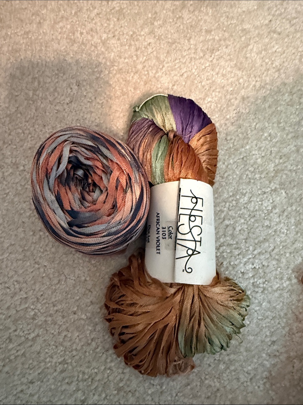 Fiesta Silk Ribbon Yarn in Apricot, Olive & Purple Gradient, blue and apricot.